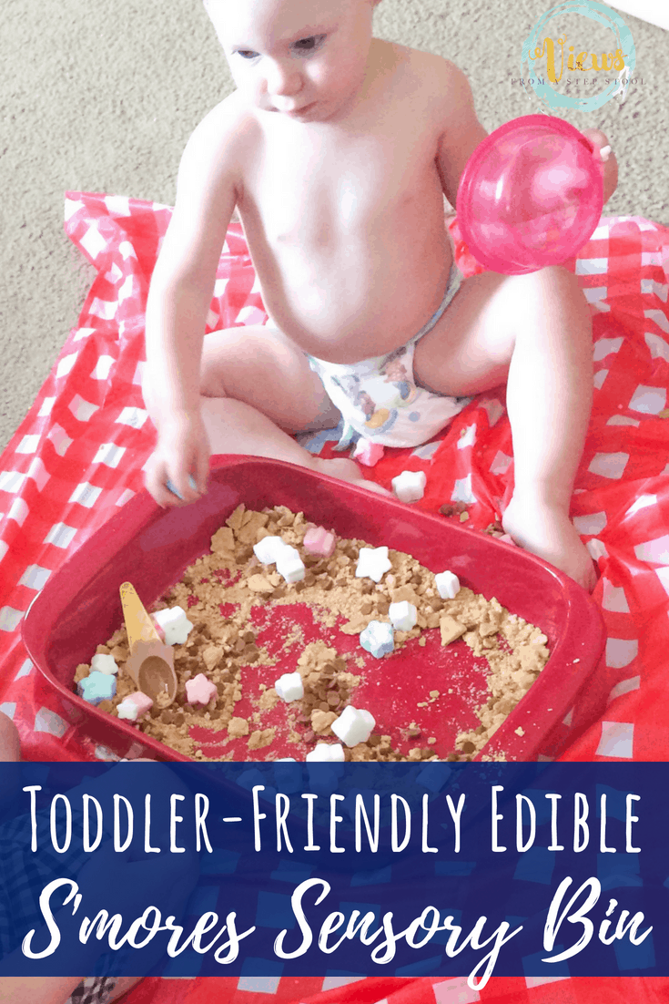 This s'mores sensory bin combines graham crackers, marshmallows and chocolate chips to create a fun and tasty edible sensory bin perfect for toddlers. #sensorybin #sensoryplay #kidsactivities #toddlers #1yearolds 