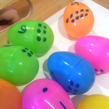 By adding some numbers to plastic Easter eggs, kids are encouraged to count and use fine motor skills in this fun Easter egg counting game for preschoolers.