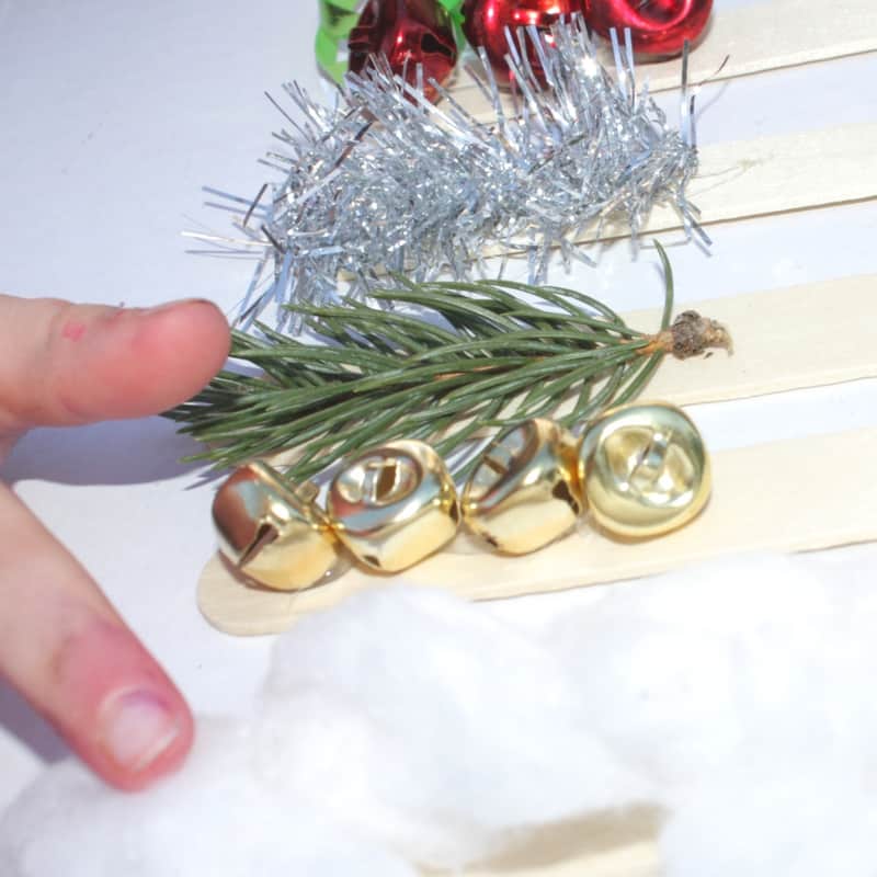 These Christmas sensory sticks allow for exploration through the senses of smell, touch, hearing and sight, and, they are incredibly simple to put together! They make for a really simple homemade toy to celebrate the holidays! 