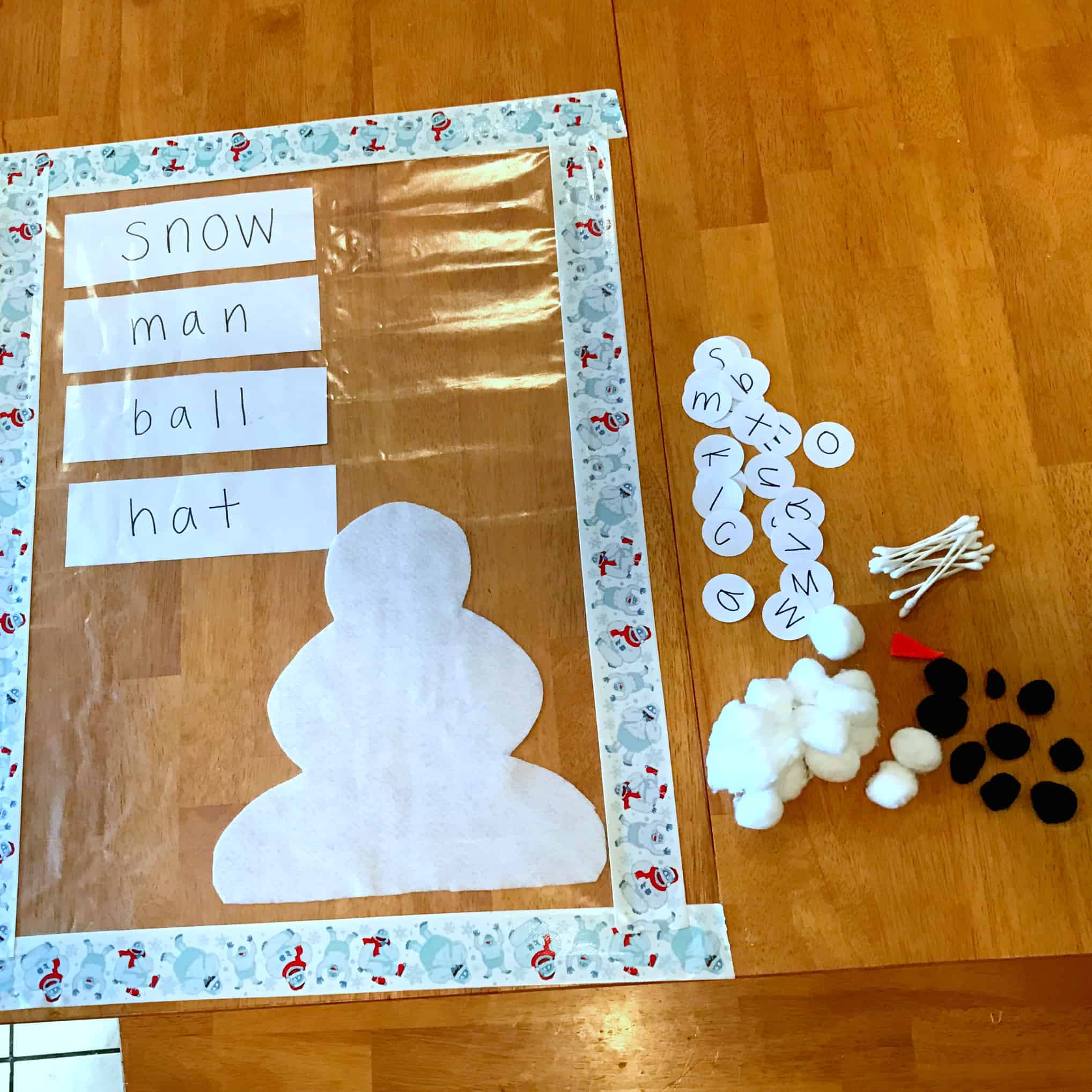 This activity is perfect for kids of varying ages. Decorate the snowman or spell snowball sight words on a sticky table! Preschoolers love this!
