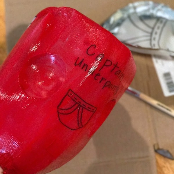 Turn an ordinary plastic jug into DIY superhero costume accessories! Make a superhero helmet and a shield! 
