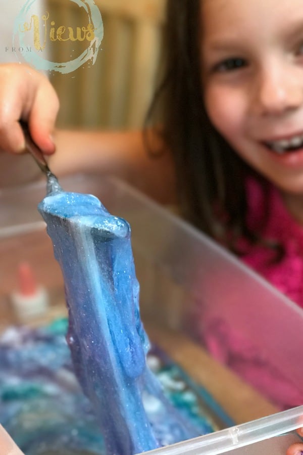 This Moana ocean slime has the perfect texture for sensory play and is made without borax, using contact solution instead with Moana toys and shells. Borax-free slime perfect for sensory play for kids. 