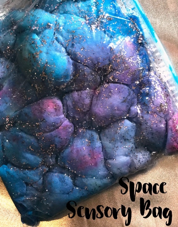 This space sensory bag is like a galaxy or a nebula that kids can hold in their hands and squish! A mess-free sensory experience for babies and toddlers.