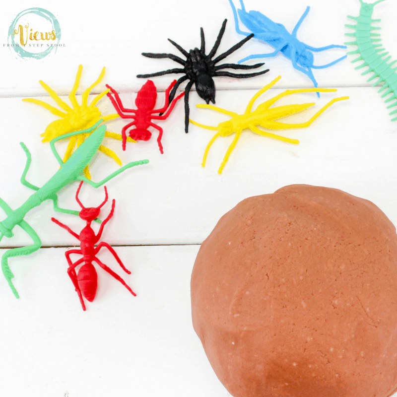 This muddy playdough recipe simply uses food coloring to turn regular homemade playdough into muddy playdough! Perfect with bug investigation for kids. #kidsactivities #playdoughrecipe #homemade #diy #sensoryplay