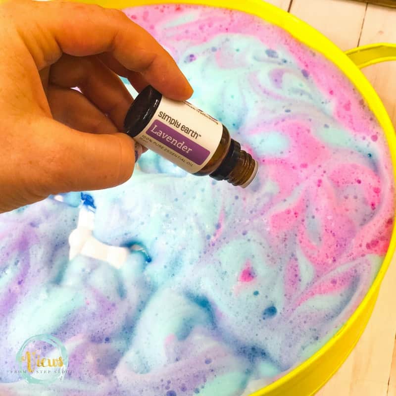 lavender essential oils and colored soap foam