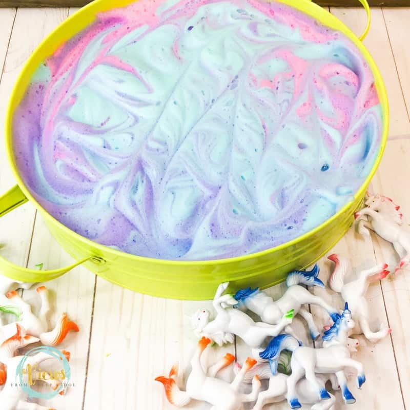 bin of blue purple and pink soap foam and unicorns