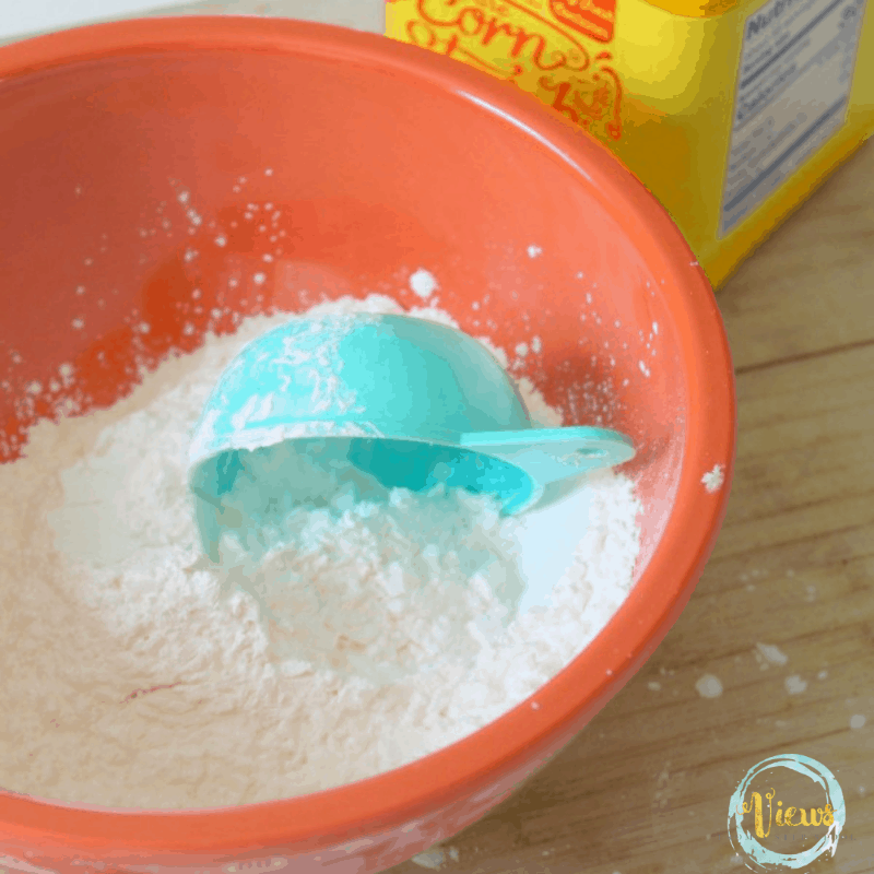 mixing together the dry ingredients for the pudding playdough