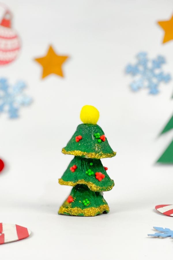 This Christmas tree egg carton craft is simple for children of all ages to make. Use it as part of your Christmas decor or for play. 